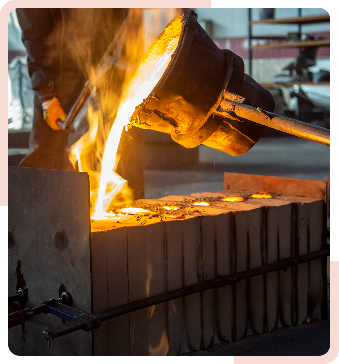 task-5 A person is pouring molten metal into a block.